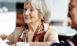 couple sitting at table having coffee