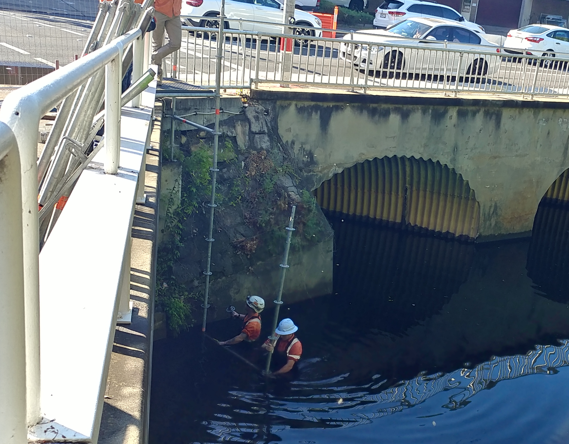 Construction workers working on the Hunts Creek Bridge