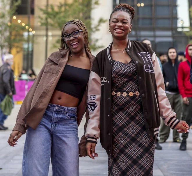 Two women smiling in Parramatta Square