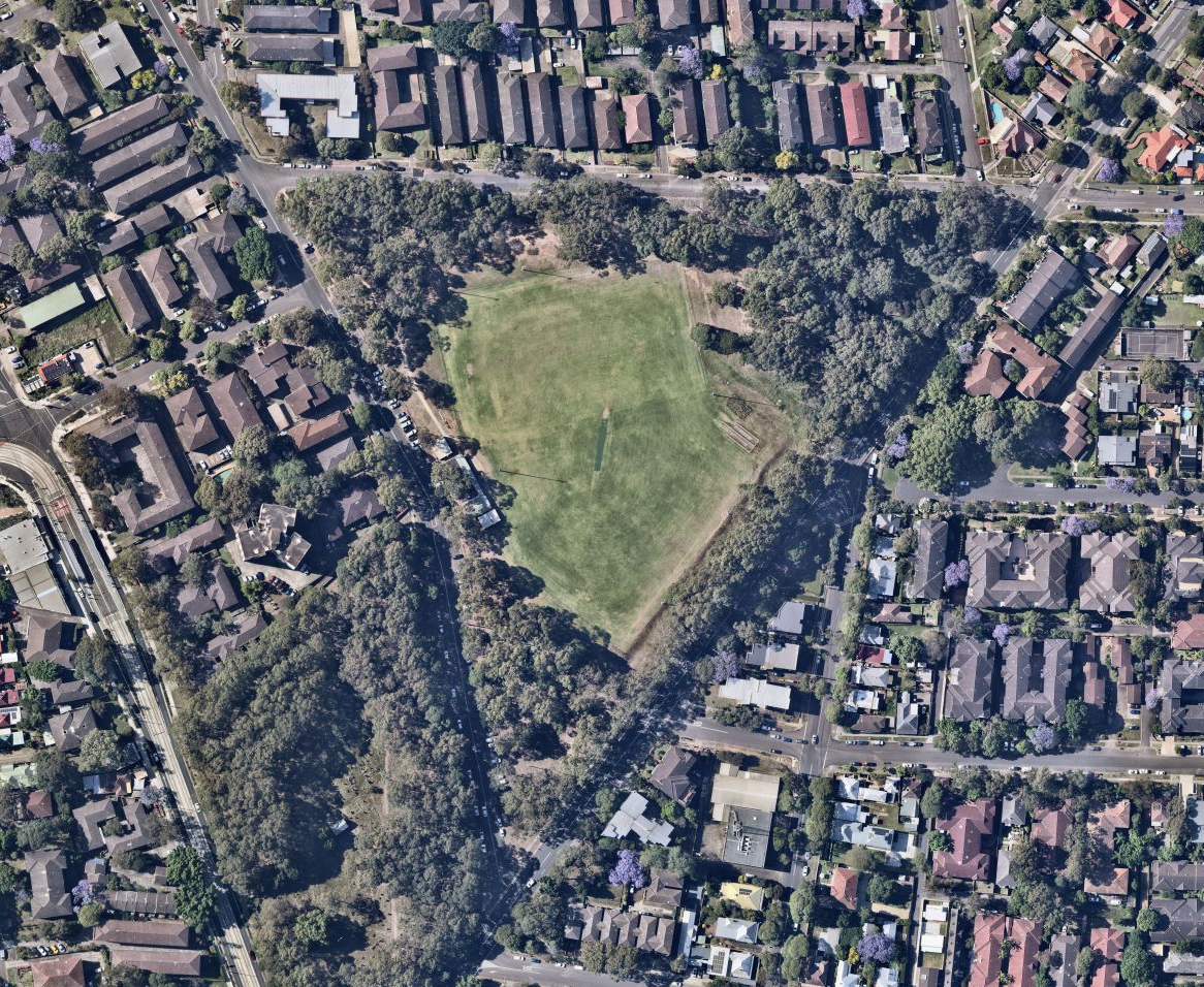 Aerial view of park and houses