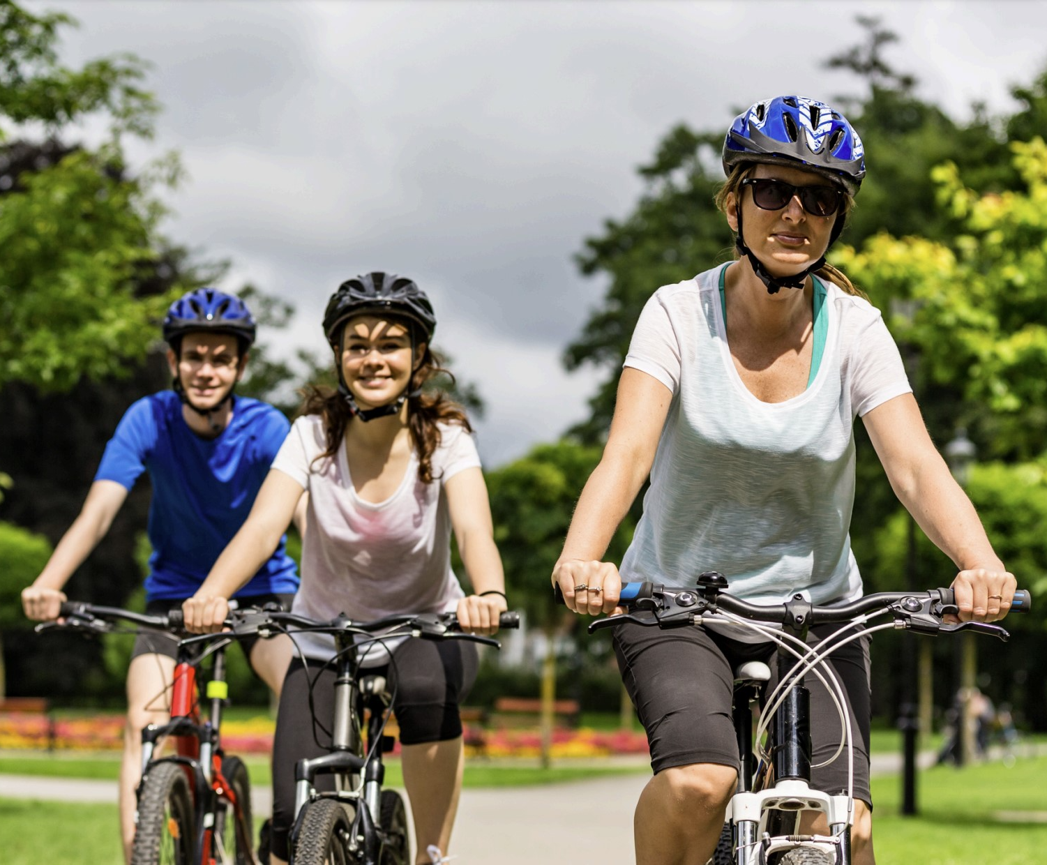 Three people on a bike