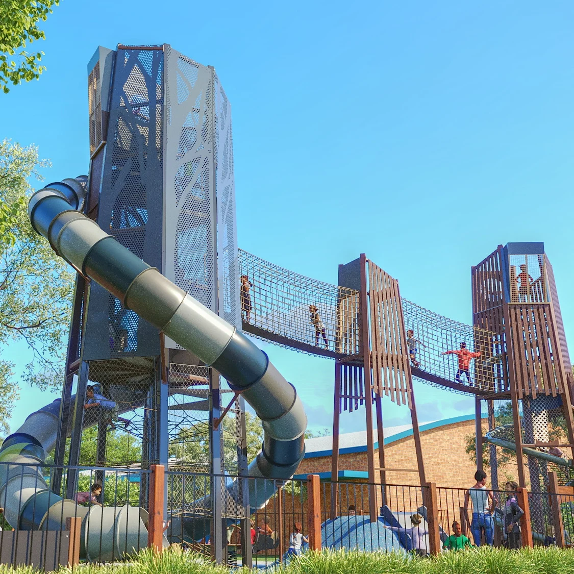 Playground with tall climbing towers, a tunnel slide and children crossing a rope bridge, with adults watching from below.