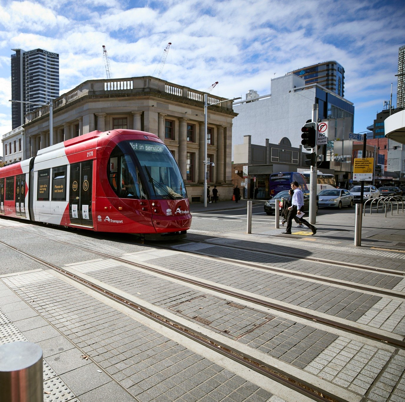 Tram travelling along eat street Parramatta