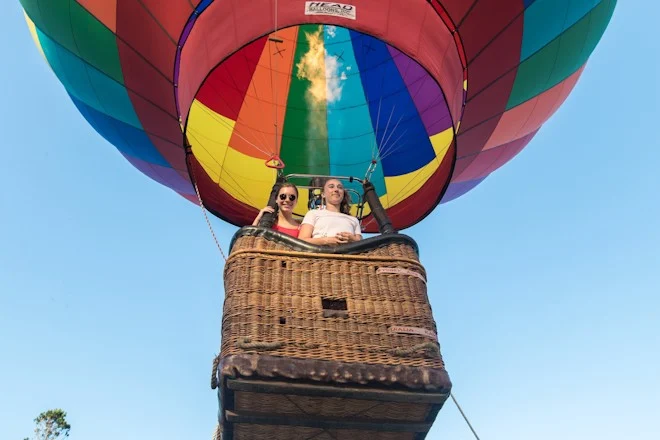 Two women in hot air balloon